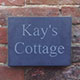 Welsh slate house sign engraved by hand Welsh slate house sign engraved by hand